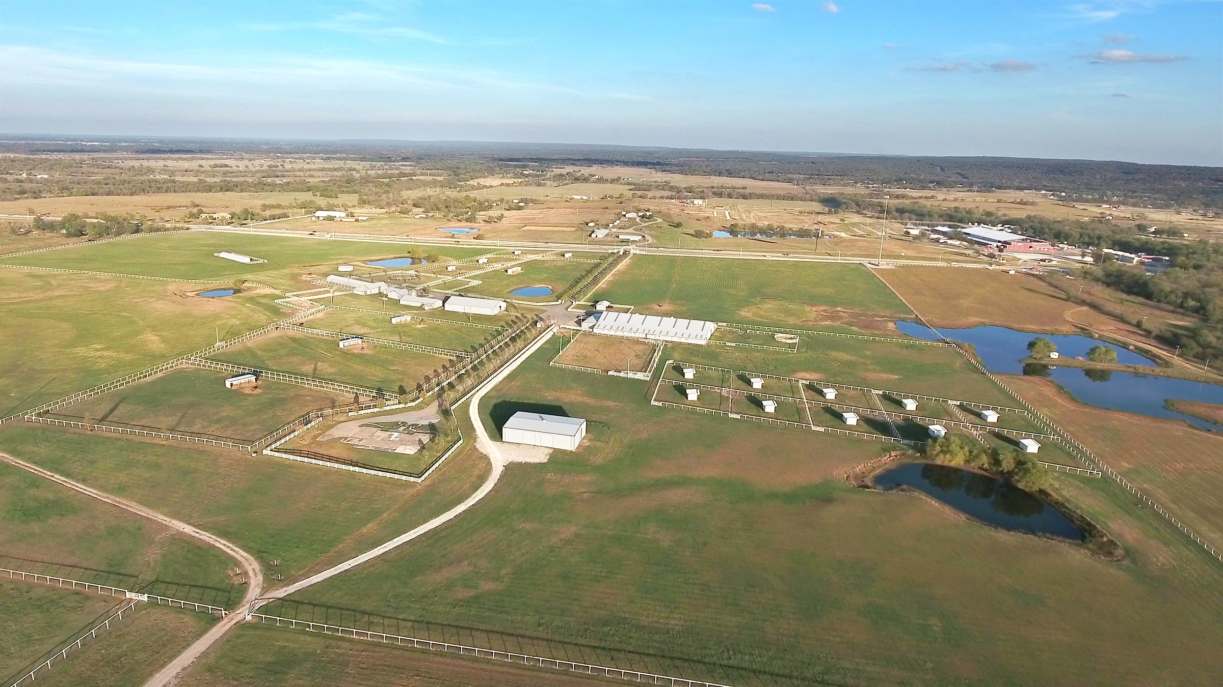 HEADQUARTERS CLOSE UP - LAND, MINERAL & PERSONAL PROPERTY AUCTION - 236+/- OFFERED IN 12 TRACTS IN OKMULGEE CO, OKLAHOMA